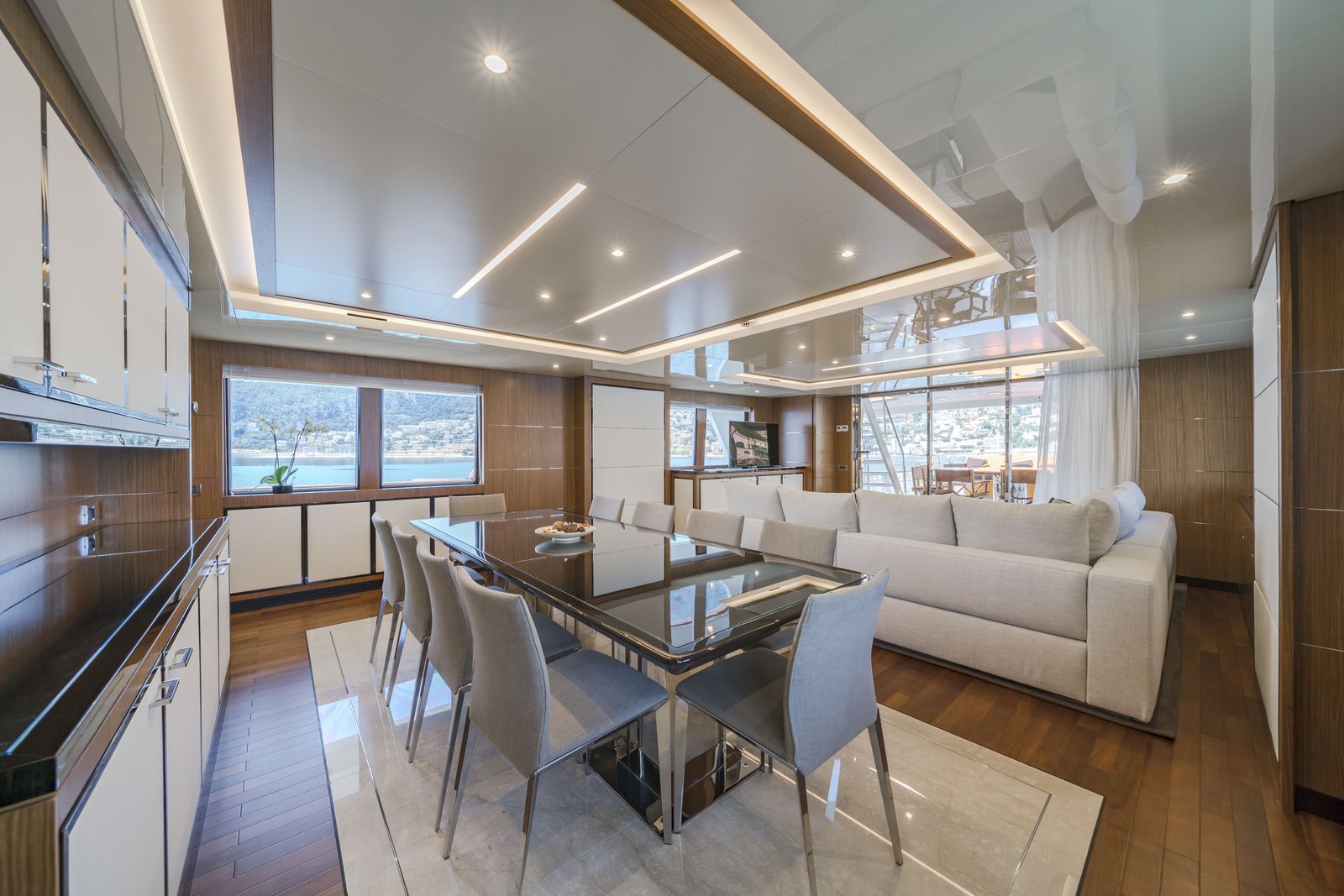 Upper deck sky lounge — dining and lounge with aft deck access