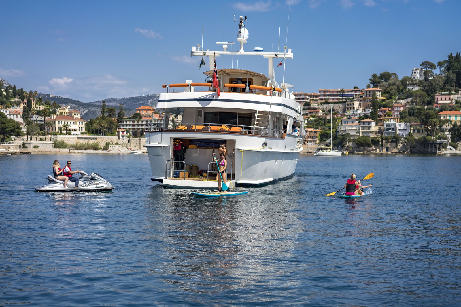 Guest leaps from Fiorente's swim platform into the bay