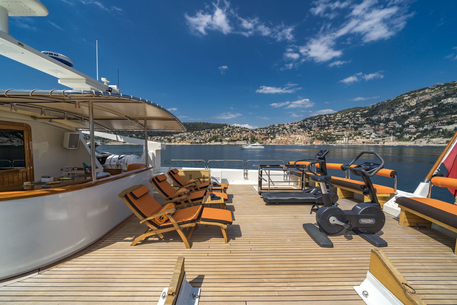Upper-deck champagne service — ice bucket and flutes