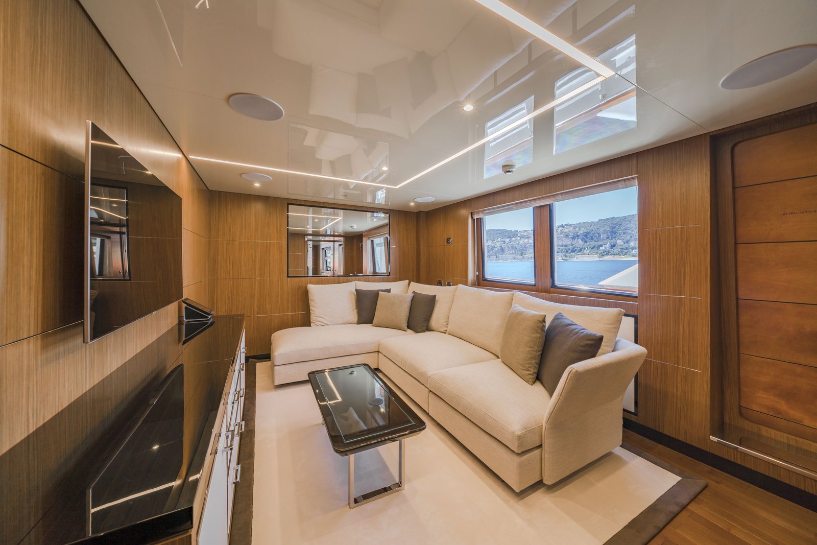 Upper deck private lounge — L-sofa, views over the Côte d'Azur
